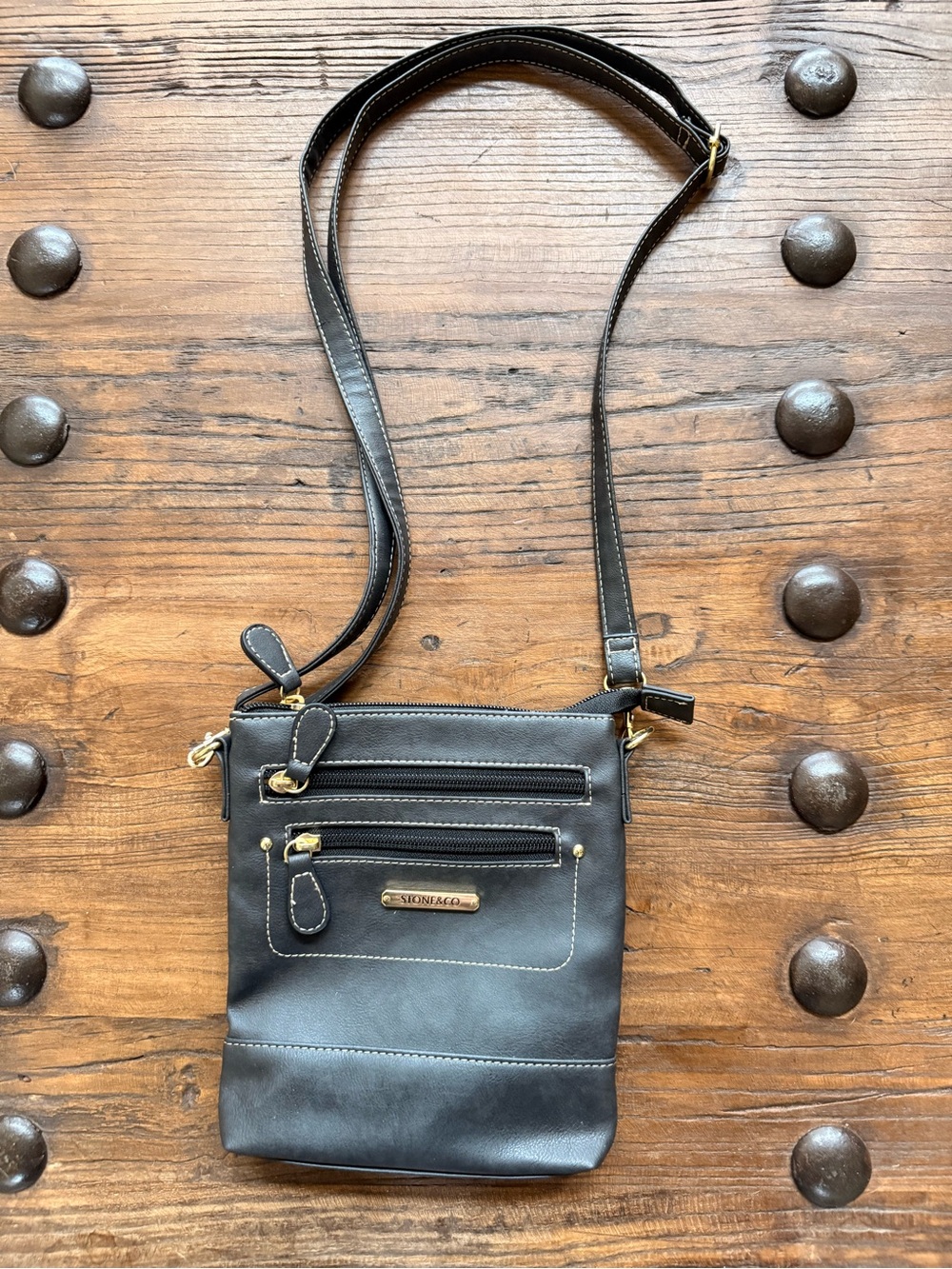 Stone & Co. Black Leather Crossbody with Gold Accents